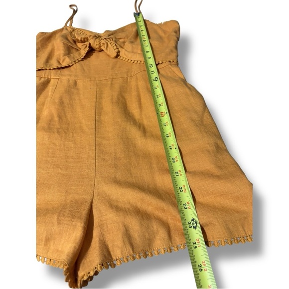 HYGVE Chic Sleeveless Crochet Trim Mustard Adjustable Straps Tie-Front Romper - Picture 9 of 16